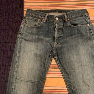 Men’s Levi button fly jeans.